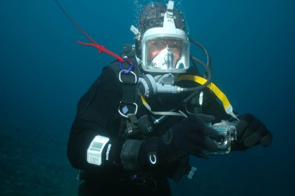 scuba diver in gear underwater
